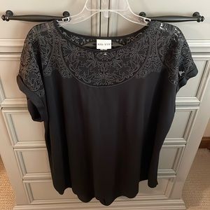 3X. Short sleeve blouse.